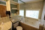 Master Bathroom with Whirlpool Tub in Condo at Waterville Valley